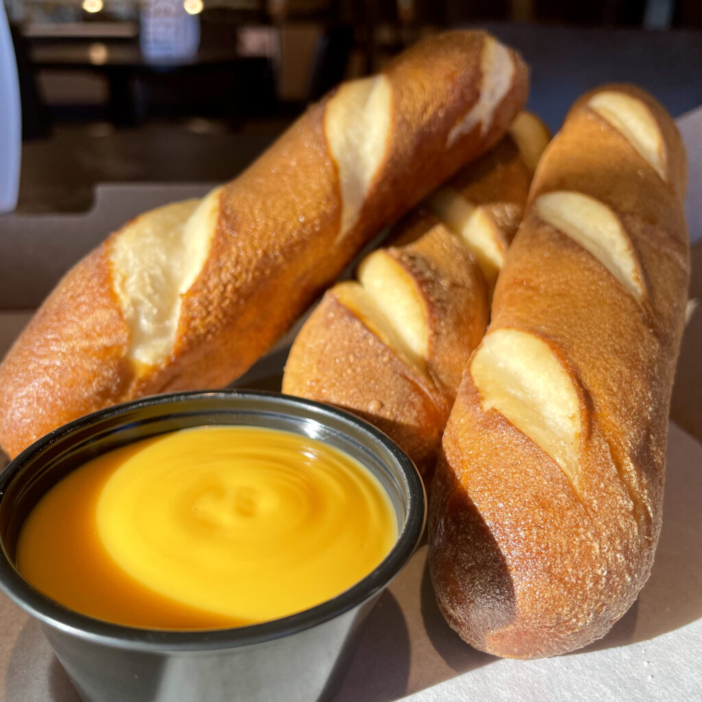 Jumbo Pretzel Sticks with a side of cheese sauce